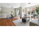 Open living space with dining area, large windows, and access to a balcony at 13524 Via Varra, Broomfield, CO 80020