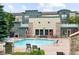 Community pool and lounge area with BBQ and picnic tables at 13524 Via Varra, Broomfield, CO 80020