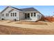 A freshly constructed single-Gathering home with a blank canvas backyard and a walkout concrete patio at 3438 N Duquesne Way, Aurora, CO 80019