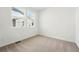 Cozy bedroom featuring plush carpet and natural light at 3438 N Duquesne Way, Aurora, CO 80019