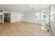 Bright and airy living room featuring recessed lighting and large windows for natural light at 3438 N Duquesne Way, Aurora, CO 80019