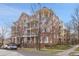 A charming multi-story brick condo building with inviting balconies, an ideal urban dwelling at 3000 E 16Th Ave # 320, Denver, CO 80206