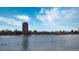 Scenic lake view with ducks and a high-rise building in the background at 3000 E 16Th Ave # 320, Denver, CO 80206