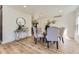 Formal dining room featuring hardwood floors, and elegant decor at 7208 S Xanthia Way, Centennial, CO 80112