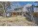 Charming two-story home with a well-manicured front yard and mature trees at 7208 S Xanthia Way, Centennial, CO 80112