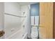 Clean bathroom features white tile, shower-tub combo, and updated fixtures at 3240 Iris Ave # G409, Boulder, CO 80301