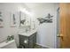 Stylish bathroom with vanity, updated lighting, and glass-enclosed shower at 3240 Iris Ave # G409, Boulder, CO 80301