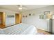 Spacious bedroom with wood floors, a closet, and shelves for storage at 3240 Iris Ave # G409, Boulder, CO 80301