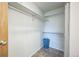 Walk-in closet with adjustable shelving and a blue laundry basket is ready for you to store all your apparel at 3240 Iris Ave # G409, Boulder, CO 80301