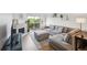 Spacious living room with a sectional sofa, fireplace, and balcony access at 3240 Iris Ave # G409, Boulder, CO 80301