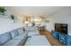 Open-concept living area flowing into dining space and updated kitchen at 3240 Iris Ave # G409, Boulder, CO 80301