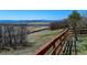Property view of a natural landscape with a wooden fence, shrubs, and distant mountain views at 952 Eaglestone Dr, Castle Rock, CO 80104