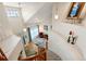 Bright entryway boasts high ceilings, chandelier, and a staircase leading to the upper level at 952 Eaglestone Dr, Castle Rock, CO 80104