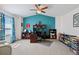 Comfortable office area features a high ceiling, natural light, and built in shelving at 952 Eaglestone Dr, Castle Rock, CO 80104