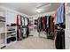 Large walk-in closet with custom shelving and rod system to maximize organization and storage space at 952 Eaglestone Dr, Castle Rock, CO 80104