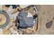 Aerial view of home with pool, patio, mature trees, and circular driveway at 12092 S Great Plain Ct, Parker, CO 80134