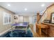 Basement game area with a foosball and ping pong table at 12092 S Great Plain Ct, Parker, CO 80134