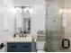 Modern bathroom with a glass-enclosed shower and vanity at 12092 S Great Plain Ct, Parker, CO 80134