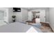 Bright bedroom featuring a sitting area, closet and a large doorway into the bathroom at 12092 S Great Plain Ct, Parker, CO 80134