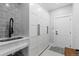 Well-organized mud room with custom built-ins and a sink at 12092 S Great Plain Ct, Parker, CO 80134