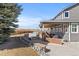 Outdoor living space with a patio, hot tub, and mountain views at 12092 S Great Plain Ct, Parker, CO 80134