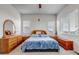 Spacious bedroom featuring plush carpeting, a beautiful ceiling fan and a calm atmosphere at 16122 Emporia Way, Brighton, CO 80602