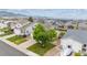 Aerial view of home with mature trees, landscaping, and well manicured lawn at 9625 Bighorn Way, Littleton, CO 80125