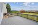 Wide angle shot showcasing the back deck that has a fantastic view of the open green space at 9625 Bighorn Way, Littleton, CO 80125