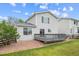 Back exterior of the home with the deck overlooking the backyard and fence at 9625 Bighorn Way, Littleton, CO 80125