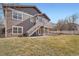 Backyard with deck, patio area, and grass at 3391 Prairie Vista Dr, Castle Rock, CO 80109