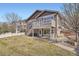 Backyard features a deck, patio and grassy area at 3391 Prairie Vista Dr, Castle Rock, CO 80109