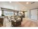 Basement featuring open living space, kitchenette, and comfortable seating at 3391 Prairie Vista Dr, Castle Rock, CO 80109