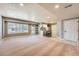 Basement featuring open living space, kitchenette, and ample lighting at 3391 Prairie Vista Dr, Castle Rock, CO 80109