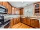 Bright kitchen with stainless steel appliances, granite countertops, and plentiful storage at 3391 Prairie Vista Dr, Castle Rock, CO 80109