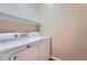 Laundry room featuring a Maytag washer and dryer with a white shelf above at 3391 Prairie Vista Dr, Castle Rock, CO 80109