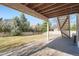 Concrete patio area beneath the deck offering outdoor space at 3391 Prairie Vista Dr, Castle Rock, CO 80109