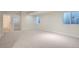 Spacious basement with new carpet and windows, offers flexible living and entertainment space at 3643 Zuni St, Denver, CO 80211