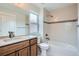 Stylish bathroom with modern fixtures, a large vanity, a separate shower, and a sleek soaking tub at 3643 Zuni St, Denver, CO 80211
