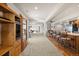 Spacious finished basement with a recreation area, dining space, and built-in entertainment center at 8211 E 128Th Pl, Thornton, CO 80602