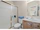 Functional bathroom featuring a shower, toilet, and vanity, designed for everyday convenience at 8211 E 128Th Pl, Thornton, CO 80602