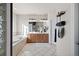 Bright bathroom with a soaking tub, tile floors and double sink vanity at 8211 E 128Th Pl, Thornton, CO 80602