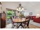 Cozy dining area with access to the deck, great natural light and view to living room at 3413 Boxelder Dr, Longmont, CO 80503