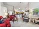 Open floor plan living room next to archway to kitchen and dining area at 3413 Boxelder Dr, Longmont, CO 80503