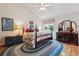 Cozy bedroom with vaulted ceiling, beautiful rug, dresser, and natural light at 3413 Boxelder Dr, Longmont, CO 80503