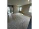 Spacious bedroom featuring carpet flooring and plenty of natural light at 251 Washington St, Erie, CO 80516