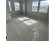 Bright bedroom with plush carpet flooring, ample natural light, and neutral wall color at 251 Washington St, Erie, CO 80516