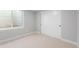Bedroom featuring modern closet doors at 251 Washington St, Erie, CO 80516