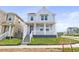 Charming two-story home with a welcoming front porch and well-manicured lawn at 251 Washington St, Erie, CO 80516