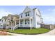 Inviting two-story home with a covered front porch and neatly maintained lawn at 251 Washington St, Erie, CO 80516