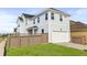 Stylish two-story house with an attached garage and well-kept lawn at 251 Washington St, Erie, CO 80516